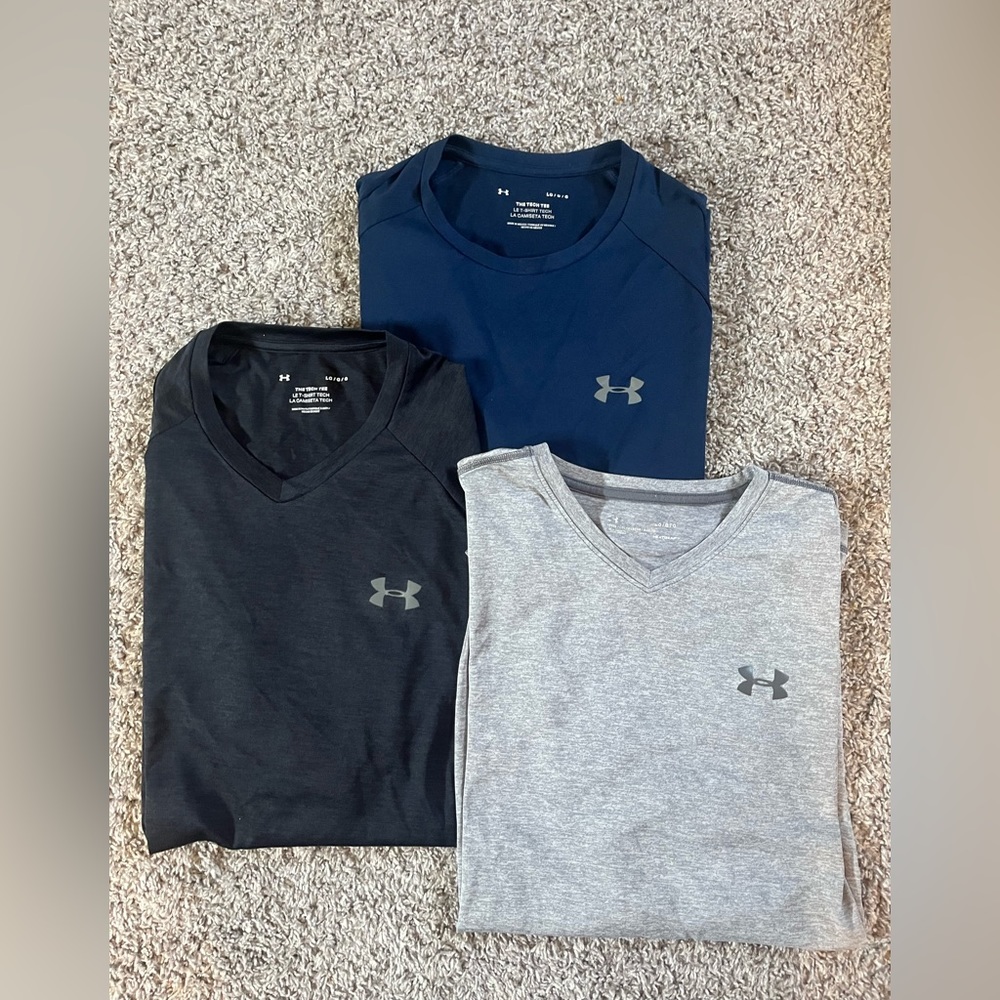 Three men’s under armour athletic shirts, barely worn!